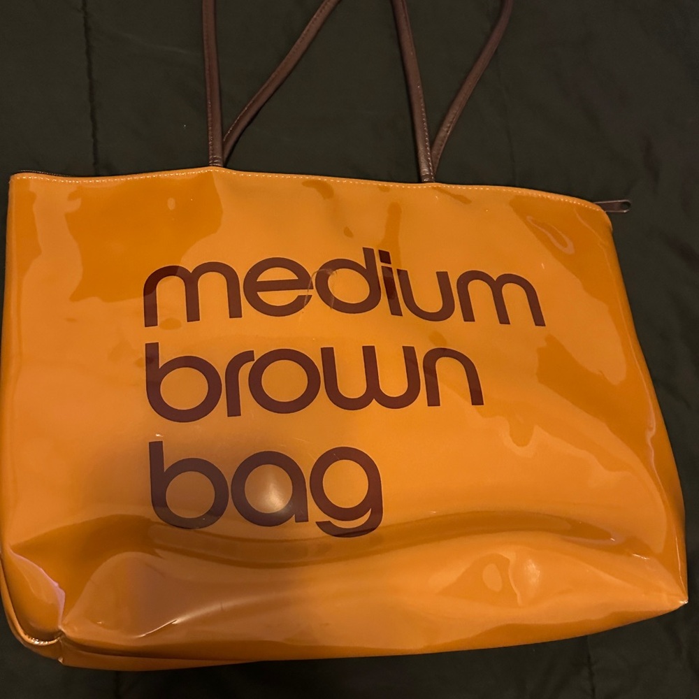 Bloomingdale’s medium brown bag with zipper